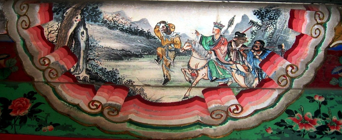 The four protagonists, from left to right: the Monkey King, Tang Sanzang (on the White Dragon Horse), Zhu Bajie, and Sha Wujing. The painting is a decoration on the Long Corridor in the Summer Palace in Beijing, China. The photograph was taken by Rolf Müller on April 17, 2005.